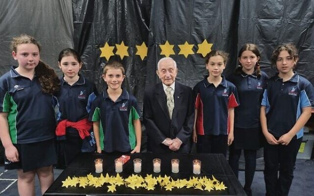 Sholem Aleichem students with Holocaust survivor Abram Goldberg. Sholem Aleichem students with Holocaust survivor Abram Goldberg.
