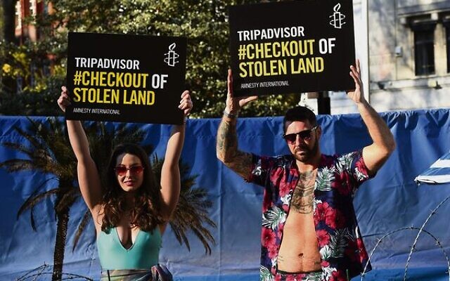 Models take part in an Amnesty International campaign calling on Tripadvisor to remove listings in Israeli settlements.
Photo: Kirsty O'Connor/PA Wire Models take part in an Amnesty International campaign calling on Tripadvisor to remove listings in Israeli settlements.
Photo: Kirsty O'Connor/PA Wire