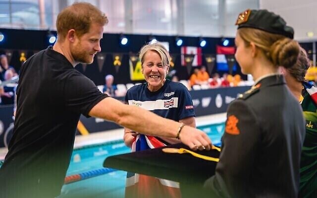 The Duke of Sussex with a British competitor during the swimming at the Invictus Games at Het Hofbad the Hague, Netherlands. Photo: Jewish News UK The Duke of Sussex with a British competitor during the swimming at the Invictus Games at Het Hofbad the Hague, Netherlands. Photo: Jewish News UK