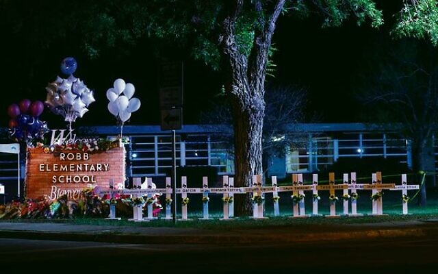Crosses outside of Robb Elementary School in Uvalde, Texas, after a gunman killed 21 people.
Photo: Yasin Ozturk/Anadolu Agency via Getty Images Crosses outside of Robb Elementary School in Uvalde, Texas, after a gunman killed 21 people.
Photo: Yasin Ozturk/Anadolu Agency via Getty Images