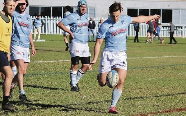 David Horwitz gets a kick away for Maccabi against Waverley last Saturday. Photo: Lawrence Brown David Horwitz gets a kick away for Maccabi against Waverley last Saturday. Photo: Lawrence Brown