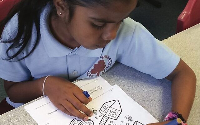 A student at Tucker Road Primary School learning about Chanukah. A student at Tucker Road Primary School learning about Chanukah.