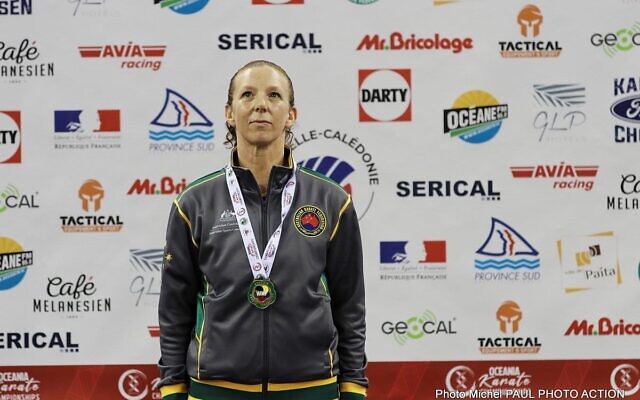 Kerry Saloner wearing her gold medal at the 2022 Oceania Karate Championships. Kerry Saloner wearing her gold medal at the 2022 Oceania Karate Championships.