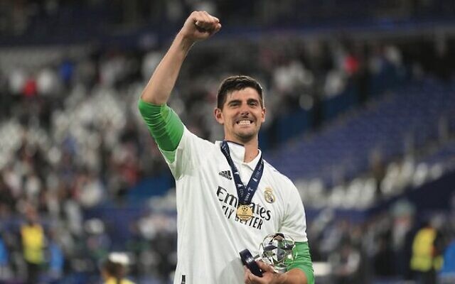 Real Madrid's goalkeeper Thibaut Courtois celebrates his team's Champions League final win. Photo: AP Photo/Kirsty Wigglesworth Real Madrid's goalkeeper Thibaut Courtois celebrates his team's Champions League final win. Photo: AP Photo/Kirsty Wigglesworth