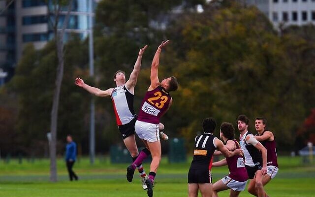 Toby Lipton leaps high for the Jackas at the opening bounce. Photo: Peter Haskin Toby Lipton leaps high for the Jackas at the opening bounce. Photo: Peter Haskin
