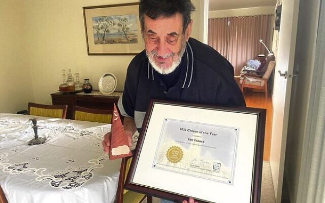 Ian Isaacs with his award. Ian Isaacs with his award.