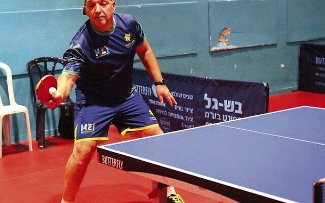 Masters table tennis player Sam Parasol in practice. Masters table tennis player Sam Parasol in practice.