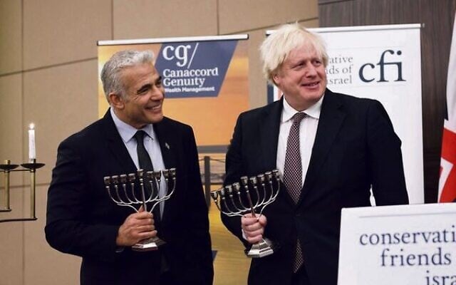 Yair Lapid (left) and Boris Johnson at a Conservative Friends of Israel event in London last year. Photo: Stuart Mitchell Yair Lapid (left) and Boris Johnson at a Conservative Friends of Israel event in London last year. Photo: Stuart Mitchell