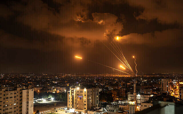 Rockets fired by Palestinian militants toward Israel, in Gaza City, Friday, Aug. 5, 2022. Palestinian officials say Israeli airstrikes on Gaza have killed at least 10 people, including a senior militant, and wounded 55 others. Photo: AP Photo/Fatima Shbair Rockets fired by Palestinian militants toward Israel, in Gaza City, Friday, Aug. 5, 2022. Palestinian officials say Israeli airstrikes on Gaza have killed at least 10 people, including a senior militant, and wounded 55 others. Photo: AP Photo/Fatima Shbair