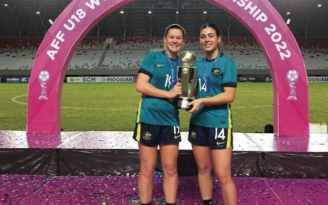 Erin Gordon (right) with Junior Matildas teammate Megan Mifsud, holding the 2022 AFF U18 Women's Football Championship trophy. Erin Gordon (right) with Junior Matildas teammate Megan Mifsud, holding the 2022 AFF U18 Women's Football Championship trophy.