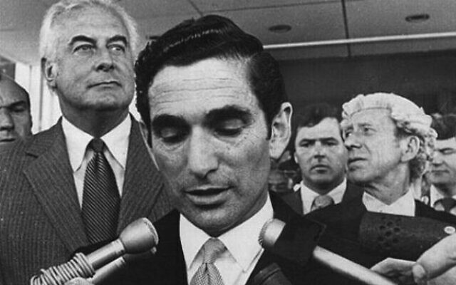 Flanked by Gough Whitlam (left), Sir David Smith reads the proclamation ending the Whitlam government in 1975. Photo: WhitlamDismissal.com Flanked by Gough Whitlam (left), Sir David Smith reads the proclamation ending the Whitlam government in 1975. Photo: WhitlamDismissal.com