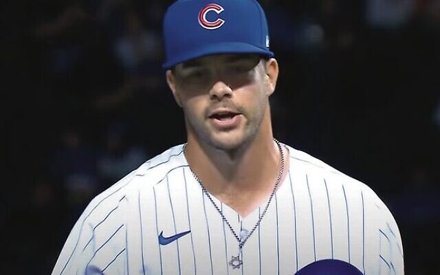 Jewish pitcher Scott Effross wears a Star of David necklace on the mound. Photo: Screenshot from YouTube Jewish pitcher Scott Effross wears a Star of David necklace on the mound. Photo: Screenshot from YouTube