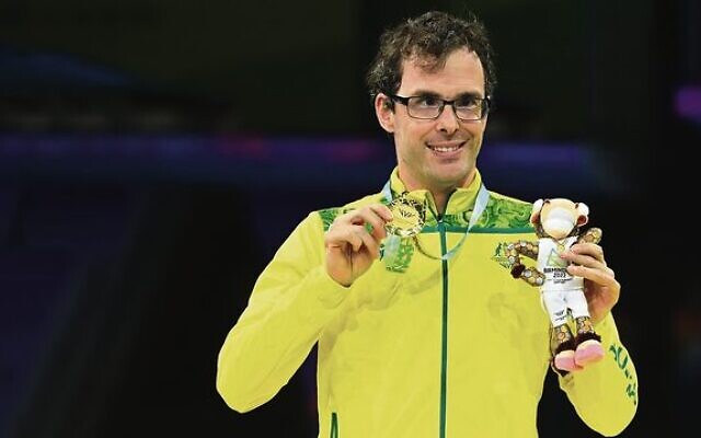 Matt Levy with his gold medal and Birmingham Commonwealth Games mascot, Perry. Photo: Supplied Matt Levy with his gold medal and Birmingham Commonwealth Games mascot, Perry. Photo: Supplied