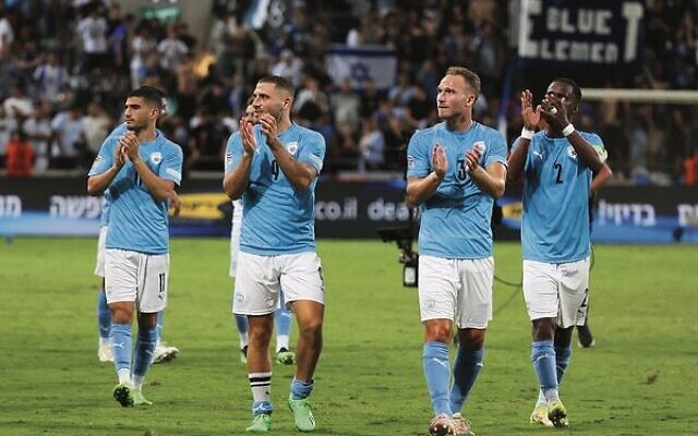 Israeli players celebrating their 2-1 win over Albania at Bloomfield Stadium, Tel Aviv, on September 24. Photo: Jack Guez/AFP Israeli players celebrating their 2-1 win over Albania at Bloomfield Stadium, Tel Aviv, on September 24. Photo: Jack Guez/AFP