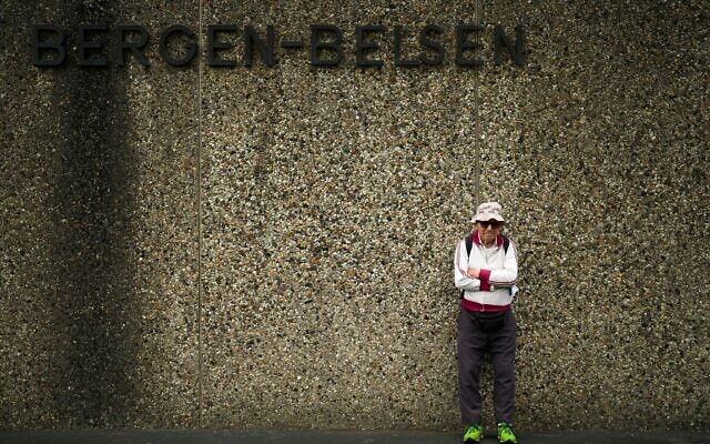 Israeli Olympic race walker Shaul Ladany poses for a photo at the entrance of the Nazi concentration camp Bergen-Belsen. Photo: AP Photo/Markus Schreiber Israeli Olympic race walker Shaul Ladany poses for a photo at the entrance of the Nazi concentration camp Bergen-Belsen. Photo: AP Photo/Markus Schreiber