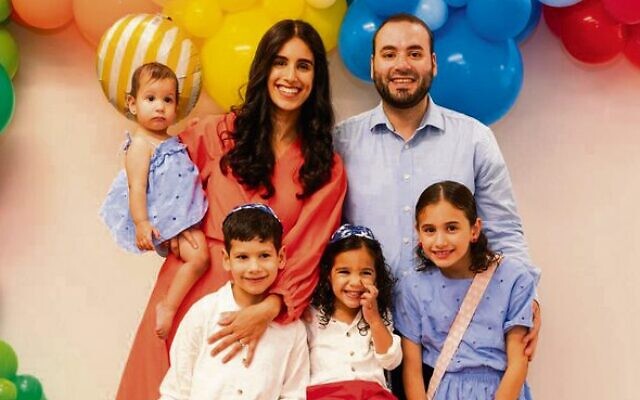 Rabbi and Rebbetzin Rapoport and family. Rabbi and Rebbetzin Rapoport and family.