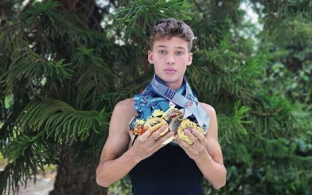 JJ Harel with all his AAU medals. Photo: Lucy Harel, via JTA JJ Harel with all his AAU medals. Photo: Lucy Harel, via JTA