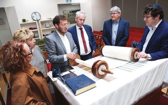 From left: Helen Lewin, Judy Fetter, Rabbi Gabi Kaltmann, Minister Andrew Giles, Daniel Mandel, David Aghion. Photo: Peter Haskin From left: Helen Lewin, Judy Fetter, Rabbi Gabi Kaltmann, Minister Andrew Giles, Daniel Mandel, David Aghion. Photo: Peter Haskin