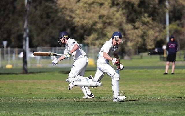 Maccabi-AJAX First XI batters Josh Rotstein (left) and Benji Jones (right) running between the wickets versus Monash University. Photo: Peter Haskin Maccabi-AJAX First XI batters Josh Rotstein (left) and Benji Jones (right) running between the wickets versus Monash University. Photo: Peter Haskin