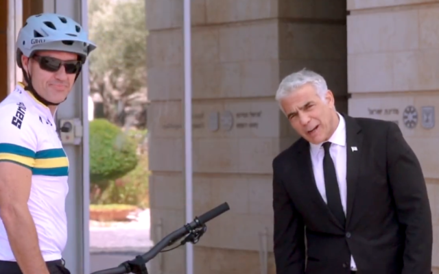 Australian Ambassador to Israel Paul Griffiths meeting Prime Minister Yair Lapid in a promotional video for Maccabiah earlier this year. Photo: Screenshot. Australian Ambassador to Israel Paul Griffiths meeting Prime Minister Yair Lapid in a promotional video for Maccabiah earlier this year. Photo: Screenshot.