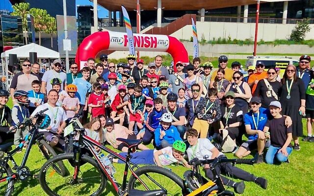 Jewish residents from Sydney's north at the finish line of last Sunday's Spring Cycle event. Jewish residents from Sydney's north at the finish line of last Sunday's Spring Cycle event.