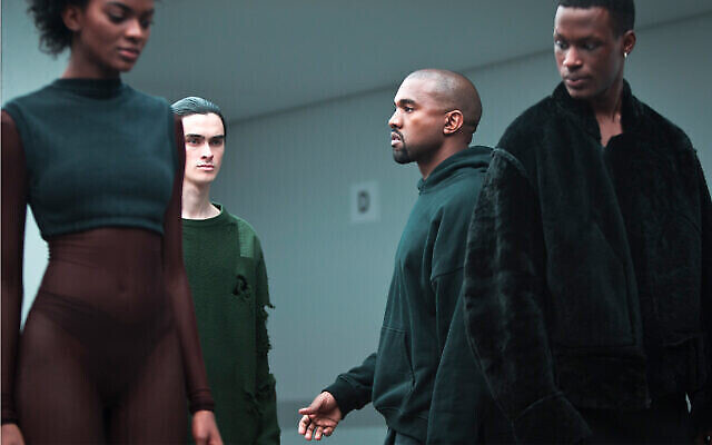Kanye West, second from right, makes final rounds before the showing of the Kanye West Adidas Fall 2015 collection at Fashion Week in New York. Photo: AP Photo/Bebeto Matthews Kanye West, second from right, makes final rounds before the showing of the Kanye West Adidas Fall 2015 collection at Fashion Week in New York. Photo: AP Photo/Bebeto Matthews