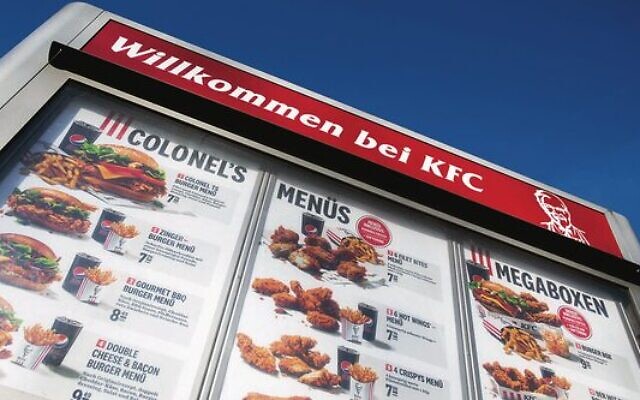 A drive-thru menu at a Kentucky Fried Chicken in Duesseldorf, Germany.
Photo: Rolf Vennenbernd/picture alliance via Getty Images via JTA A drive-thru menu at a Kentucky Fried Chicken in Duesseldorf, Germany.
Photo: Rolf Vennenbernd/picture alliance via Getty Images via JTA