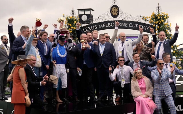 Members of Gold Trip's ownership group celebrating with jockey Mark Zahra. Sonney Roth is in the back row, fourth from the right. Photo: Screenshot from footage by Victoria Racing Club Members of Gold Trip's ownership group celebrating with jockey Mark Zahra. Sonney Roth is in the back row, fourth from the right. Photo: Screenshot from footage by Victoria Racing Club