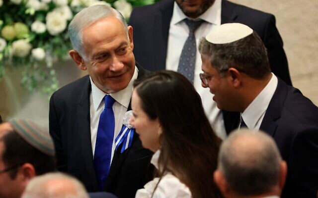 Israel's Likud Party leader Benjamin Netanyahu arrives during the swearing-in ceremony for Israeli lawmakers at the Knesset, Israel's parliament, in Jerusalem, Tuesday, Nov. 15, 2022. Israeli lawmakers were sworn in at the Knesset, on Tuesday, following national elections earlier this month. (Abir Sultan/Pool Photo via AP) Israel's Likud Party leader Benjamin Netanyahu arrives during the swearing-in ceremony for Israeli lawmakers at the Knesset, Israel's parliament, in Jerusalem, Tuesday, Nov. 15, 2022. Israeli lawmakers were sworn in at the Knesset, on Tuesday, following national elections earlier this month. (Abir Sultan/Pool Photo via AP)