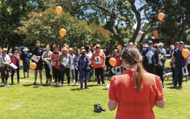 Cassandra Barrett addressing those participating in the Walk Against Family Violence. Cassandra Barrett addressing those participating in the Walk Against Family Violence.