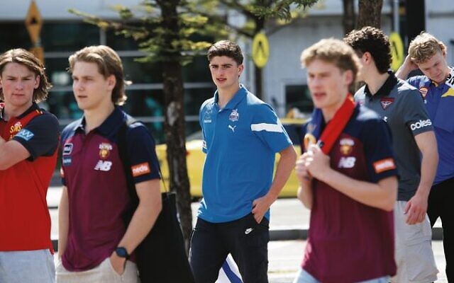 Harry Sheezel (centre) walking among his fellow draft picks the morning after the draft. Photo: Peter Haskin. Harry Sheezel (centre) walking among his fellow draft picks the morning after the draft. Photo: Peter Haskin.