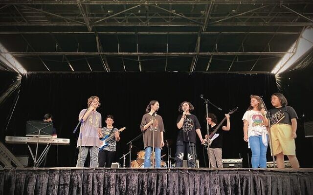 Masada College Rock Band rocking it out at the Battle of the Bands. From left: Guangzhao Zhu, Ariel Benoliel, Jason Berger, Karina Golub, Jade Kaye, Yam Tchelet, Ilana Benoliel and Angelina Wu. Masada College Rock Band rocking it out at the Battle of the Bands. From left: Guangzhao Zhu, Ariel Benoliel, Jason Berger, Karina Golub, Jade Kaye, Yam Tchelet, Ilana Benoliel and Angelina Wu.