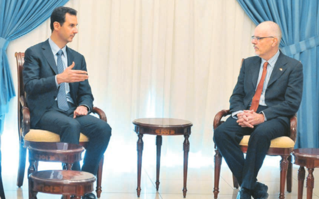 Tim Anderson with Bashar al-Assad in 2013. Photo: AP Photo/SANA Tim Anderson with Bashar al-Assad in 2013. Photo: AP Photo/SANA