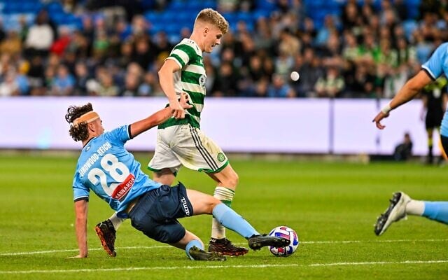 Sydney FC's Jake Girdwood-Reich challenges Celtic FC player Scott Robertson for the ball during the match on November 17 at Allianz Stadium. Photo: Keith McInnes Sydney FC's Jake Girdwood-Reich challenges Celtic FC player Scott Robertson for the ball during the match on November 17 at Allianz Stadium. Photo: Keith McInnes