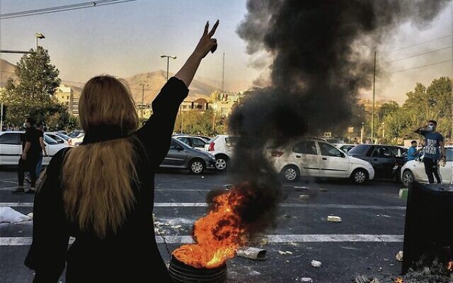Iranians protest the death of 22-year-old Mahsa Amini after she was detained by the morality police, in Tehran, October 1, 2022.
Photo: AP Photo/Middle East Images Iranians protest the death of 22-year-old Mahsa Amini after she was detained by the morality police, in Tehran, October 1, 2022.
Photo: AP Photo/Middle East Images