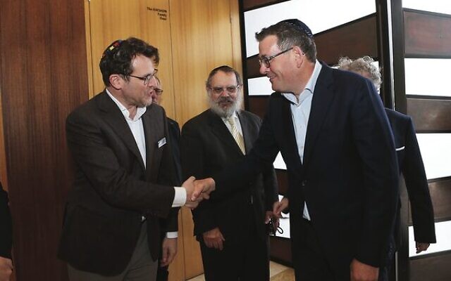 Visiting Central Shule, Premier Daniel Andrews (right) meets JCCV president Daniel Aghion (left) as Rabbi Yitzhok Riesenberg looks on. Photo: Peter Haskin Visiting Central Shule, Premier Daniel Andrews (right) meets JCCV president Daniel Aghion (left) as Rabbi Yitzhok Riesenberg looks on. Photo: Peter Haskin