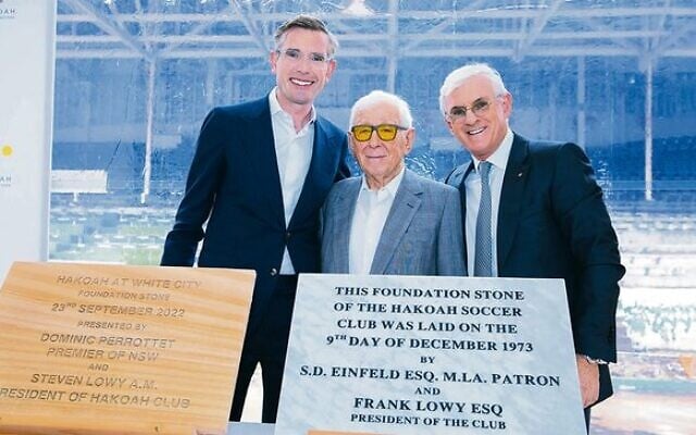 From left: Premier Dominic Perrottet, Sir Frank Lowy and Hakoah president Steven Lowy unveil the foundation stones for Hakoah at White City. Photo: Giselle Haber From left: Premier Dominic Perrottet, Sir Frank Lowy and Hakoah president Steven Lowy unveil the foundation stones for Hakoah at White City. Photo: Giselle Haber