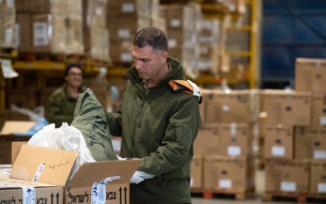 An IDF Home Front Command soldier prepares a shipment of aid and equipment for the search and rescue team departing to assist Turkey in the wake of a deadly earthquake. Photo: Israel Defense Forces An IDF Home Front Command soldier prepares a shipment of aid and equipment for the search and rescue team departing to assist Turkey in the wake of a deadly earthquake. Photo: Israel Defense Forces