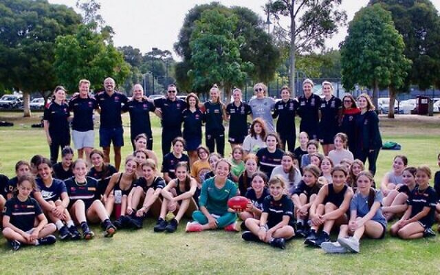 Jemima Montag (front at centre) with participants, coaches, and some St Kilda AFLW players at last Sunday's AJAX girls' open day. Photo: AJAX Jemima Montag (front at centre) with participants, coaches, and some St Kilda AFLW players at last Sunday's AJAX girls' open day. Photo: AJAX