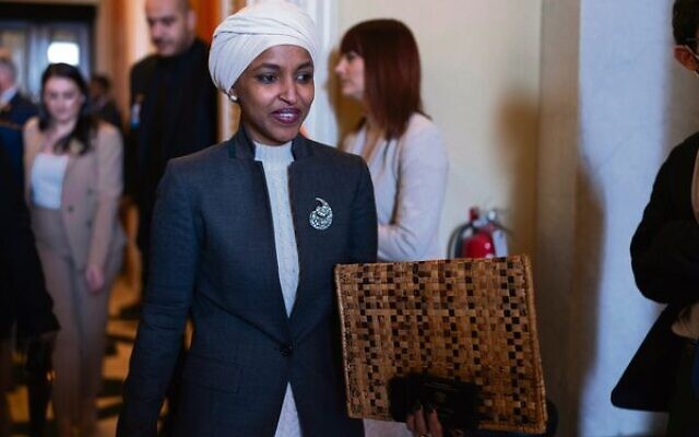 Ilhan Omar leaves the House chamber at the Capitol in Washington last Thursday. Photo: AP Photo/Jose Luis Magana Ilhan Omar leaves the House chamber at the Capitol in Washington last Thursday. Photo: AP Photo/Jose Luis Magana