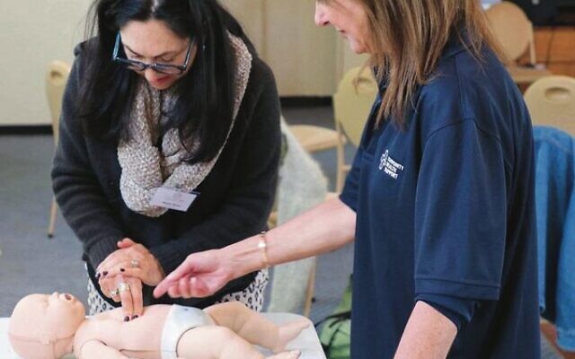 CHS's Hilary Jacobson (right) training a Mum for Mum volunteer in infant CPR. CHS's Hilary Jacobson (right) training a Mum for Mum volunteer in infant CPR.