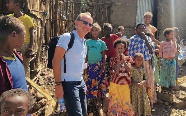 UIA NSW chair Gary Perlstein with Jewish Ethiopians in the Gondar region. UIA NSW chair Gary Perlstein with Jewish Ethiopians in the Gondar region.