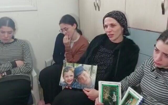 Devora Paley holds a picture of her sons Yaakov Yisrael and Asher Menahem, who were killed in a terror attack in Jerusalem, as she speaks to reporters while marking the traditional Jewish mourning period. Photo: Twitter screenshot. Devora Paley holds a picture of her sons Yaakov Yisrael and Asher Menahem, who were killed in a terror attack in Jerusalem, as she speaks to reporters while marking the traditional Jewish mourning period. Photo: Twitter screenshot.
