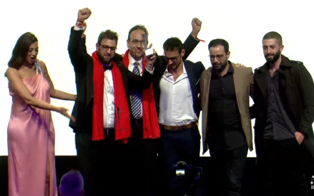 Israeli chef Tomer Tal and his team at the George & John restaurant in Tel Aviv receive an award after ranking sixth among the 50 best dining establishments in the Middle East and North Africa, Dubai, United Arab Emirates. Photo: YouTube/50 Best Restaurants TV screenshot Israeli chef Tomer Tal and his team at the George & John restaurant in Tel Aviv receive an award after ranking sixth among the 50 best dining establishments in the Middle East and North Africa, Dubai, United Arab Emirates. Photo: YouTube/50 Best Restaurants TV screenshot