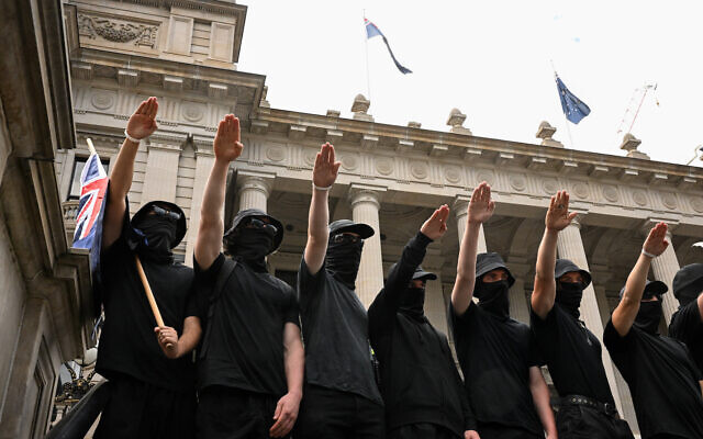 Neo-Nazi protesters face-off with transgender rights supporters outside Parliament House in Melbourne, Saturday, March 18, 2023. Photo: AAP Image/James Ross Neo-Nazi protesters face-off with transgender rights supporters outside Parliament House in Melbourne, Saturday, March 18, 2023. Photo: AAP Image/James Ross