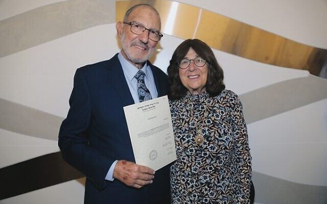 Rav Aron and Judy Amzalak with his smichah certificate. Photo: Elena Marguleva Rav Aron and Judy Amzalak with his smichah certificate. Photo: Elena Marguleva