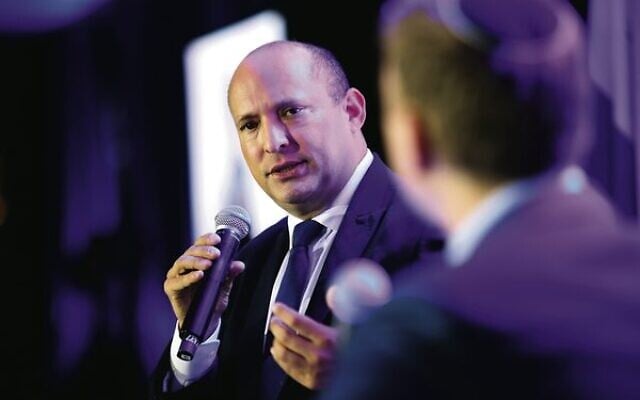 Former Israeli PM Naftali Bennett in conversation with Jeremy Leibler at the UIA gala event in Melbourne.
Photo: Peter Haskin Former Israeli PM Naftali Bennett in conversation with Jeremy Leibler at the UIA gala event in Melbourne.
Photo: Peter Haskin