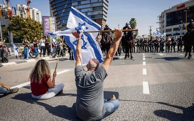 Israelis block a road and clash with police as they protest against the government's planned judicial overhaul. Photo: Erik Marmor/Flash90 Israelis block a road and clash with police as they protest against the government's planned judicial overhaul. Photo: Erik Marmor/Flash90