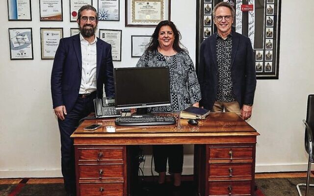 From left: Rabbi Yaakov Glasman, Janice Iloni-Furstenberg and Michael Bennett with Sir John Monash's desk. Photo: Paul Topol. From left: Rabbi Yaakov Glasman, Janice Iloni-Furstenberg and Michael Bennett with Sir John Monash's desk. Photo: Paul Topol.