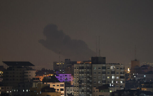 Smoke rises above buildings in Gaza City as Israel launched air strikes on the Palestinian enclave on late April 6, 2023. Photo: Mohammed ABED / AFP Smoke rises above buildings in Gaza City as Israel launched air strikes on the Palestinian enclave on late April 6, 2023. Photo: Mohammed ABED / AFP